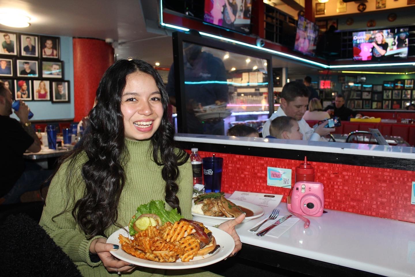 Girl at the Ellen's Stardust Diner in NYC.